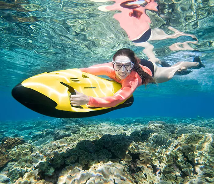 Girl underwater while using a Seabob